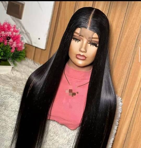 Silky straight human hair wig styled at Mibest Beauty