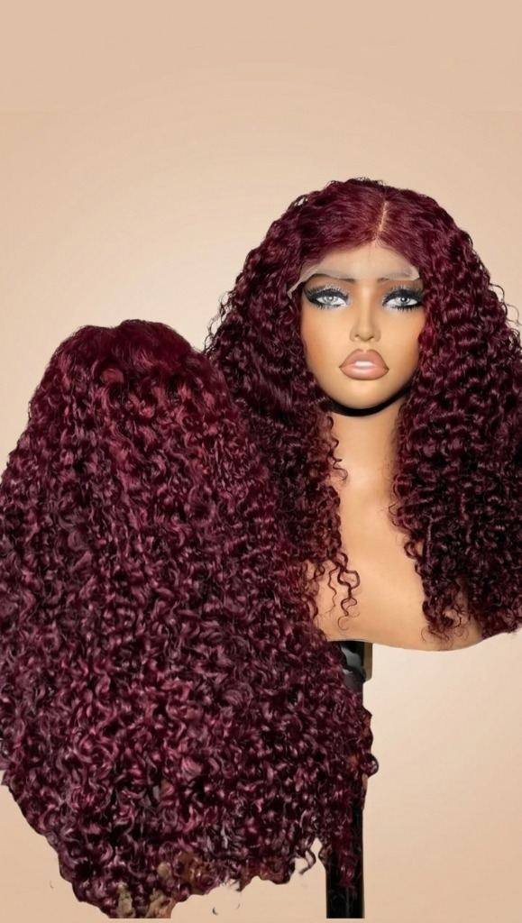 Burgundy curly human hair wig styled at Mibest Beauty